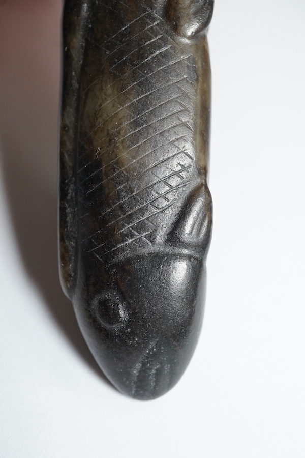 A Chinese black and white jade 'fish' sword fitting, Song or later